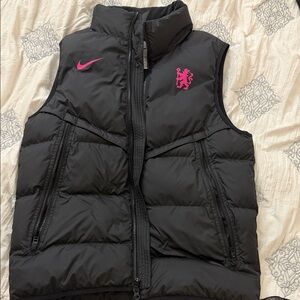 Nike woman’s chelsea strike free down Puffer Vest with Pink Accents